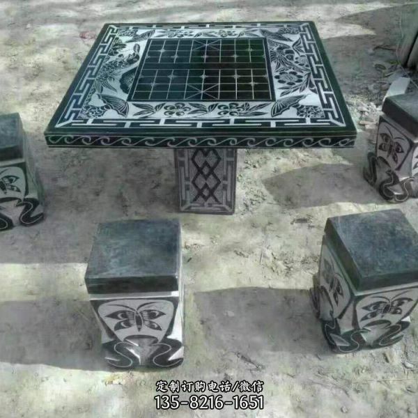 公園擺放青石做舊浮雕下棋盤方桌石凳
