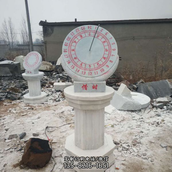 戶外景區(qū)創(chuàng)意圓柱上的石雕日晷雕塑