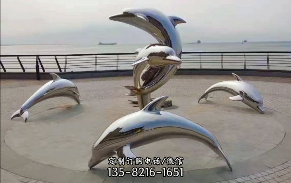 海邊創意不銹鋼鏡面跳躍的海豚雕塑