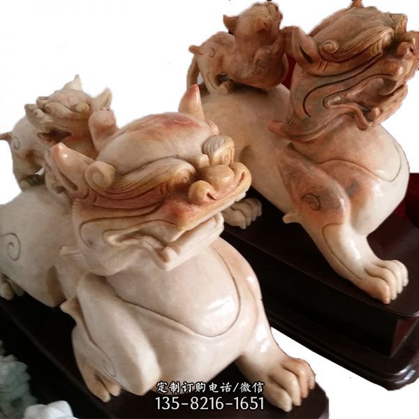 戶外漢白玉晚霞紅石雕創意抽象獅子雕塑