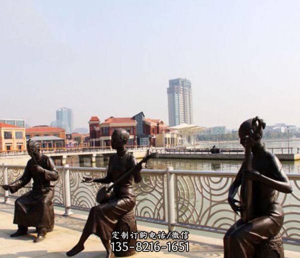 海邊銅雕創意拉二胡雕塑