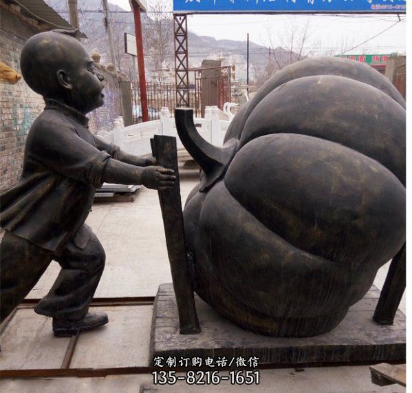 公園推南瓜的小男孩銅雕南瓜雕塑