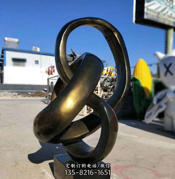 景區(qū)別墅不銹鋼環(huán)形纏繞的飄帶雕塑