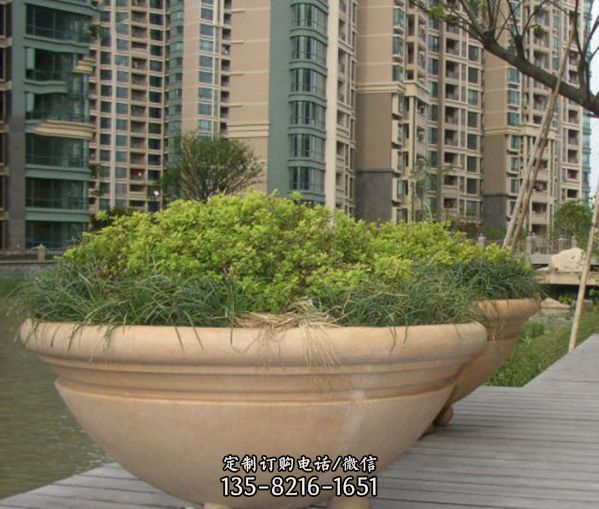 城市街道創(chuàng)意晚霞紅石雕花盆雕塑