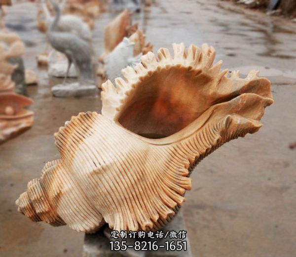 商場(chǎng)擺放的螺紋的花崗巖石雕創(chuàng)意海螺雕塑