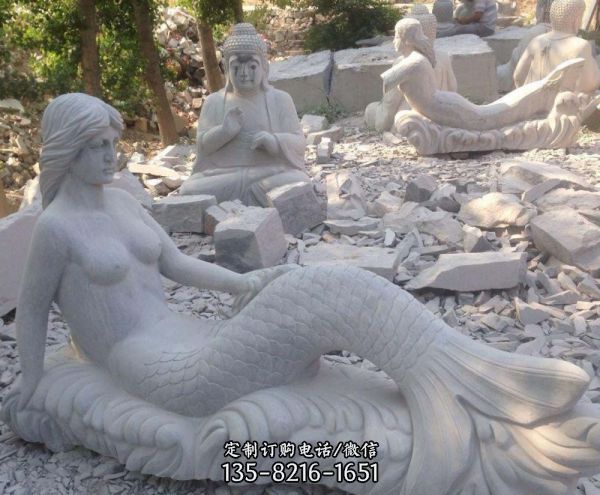街道上擺放的漢白玉石雕創意美人魚雕塑